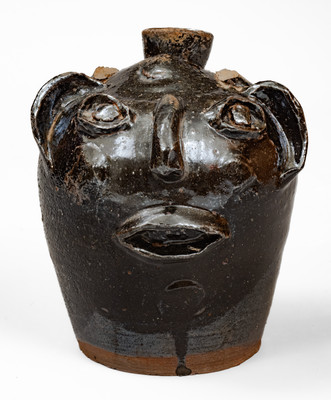 Rare Alkaline-Glazed Stoneware Face Harvest Jug, probably Upstate SC, late 19th / early 20th century