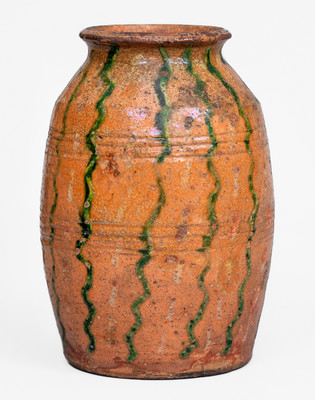 Scarce Redware Jar with Two-Color Slip Decoration, American, early to mid 19th century