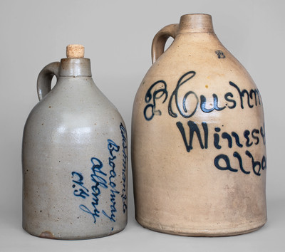 Lot of Two: Cushman & Co. / Albany, NY Stoneware Script Advertising Jugs