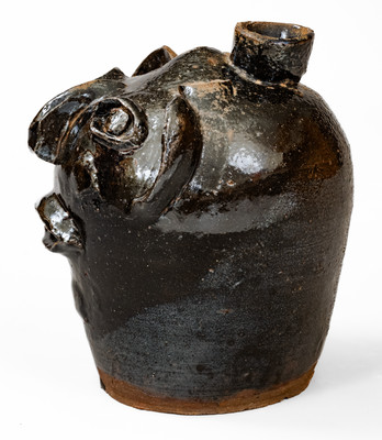 Rare Alkaline-Glazed Stoneware Face Harvest Jug, probably Upstate SC, late 19th / early 20th century