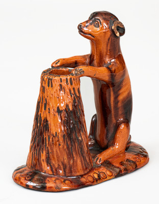 Glazed Pennsylvania Redware Figure of a Dog with Stump, circa 1850-1880