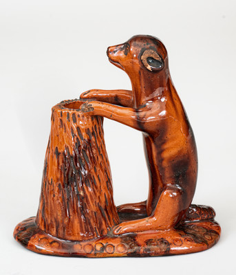 Glazed Pennsylvania Redware Figure of a Dog with Stump, circa 1850-1880