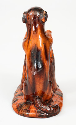 Glazed Pennsylvania Redware Figure of a Dog with Stump, circa 1850-1880