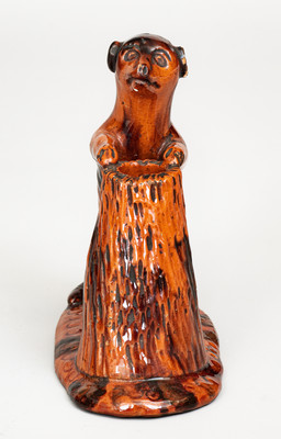 Glazed Pennsylvania Redware Figure of a Dog with Stump, circa 1850-1880
