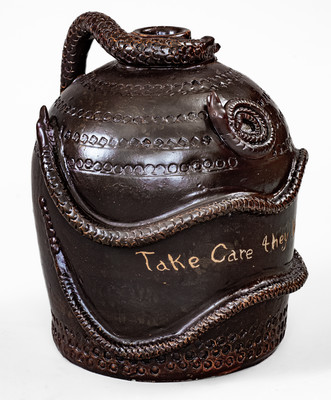 Fine and Rare Ohio Stoneware Snake Temperance Jug: "Take Care they Will Bite"