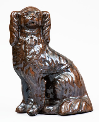 Scarce JORDAN, New York Albany-Slip-Glazed Stoneware Spaniel, mid 19th century