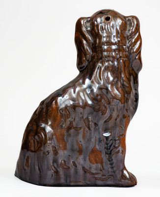 Scarce JORDAN, New York Albany-Slip-Glazed Stoneware Spaniel, mid 19th century