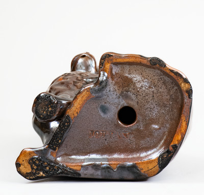 Scarce JORDAN, New York Albany-Slip-Glazed Stoneware Spaniel, mid 19th century