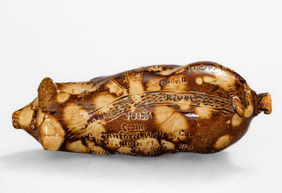 Very Rare Anna Pottery Rockingham-Glazed Pig Bottle, circa 1880