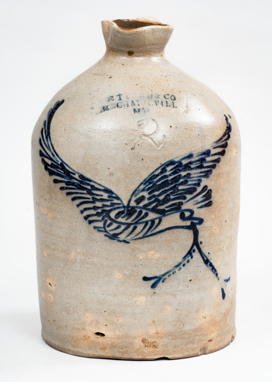 Outstanding 2 Gal. Stoneware Syrup Jug with Flying Eagle Decoration and MECHANICVILLE, NY Advertising