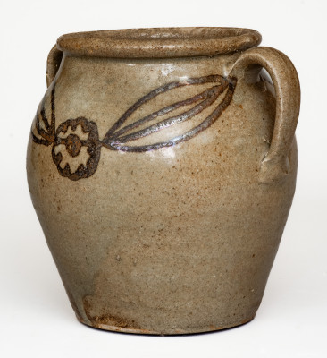 Very Rare Open-Handled Alkaline-Glazed Stoneware Jar with Iron Slip Floral Decoration, attributed to Phoenix Factory, Shaw s Creek, Edgefield District, SC, circa 1840.