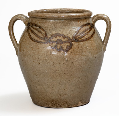 Very Rare Open-Handled Alkaline-Glazed Stoneware Jar with Iron Slip Floral Decoration, attributed to Phoenix Factory, Shaw s Creek, Edgefield District, SC, circa 1840.
