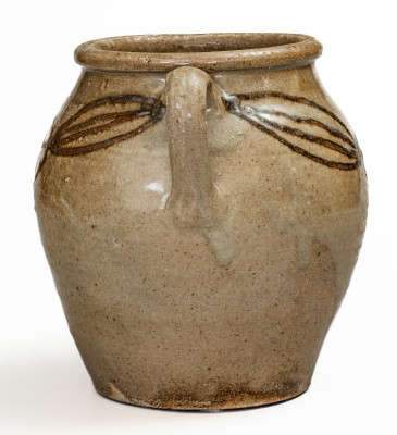 Very Rare Open-Handled Alkaline-Glazed Stoneware Jar with Iron Slip Floral Decoration, attributed to Phoenix Factory, Shaw s Creek, Edgefield District, SC, circa 1840.