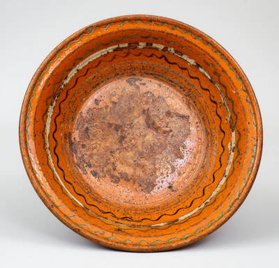 Redware Bowl w/ Three-Color Slip Decoration, Mid-Atlantic or Southern U.S., early 19th century