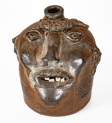Very Rare Georgia Stoneware Face Jug w/ Applied Lizard, late 19th century