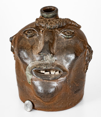 Very Rare Georgia Stoneware Face Jug w/ Applied Lizard, late 19th century