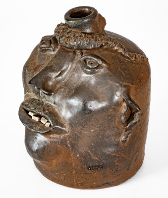 Very Rare Georgia Stoneware Face Jug w/ Applied Lizard, late 19th century