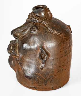 Very Rare Georgia Stoneware Face Jug w/ Applied Lizard, late 19th century