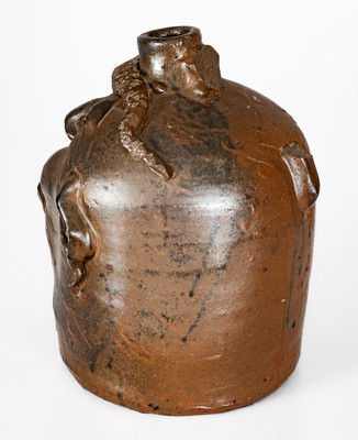 Very Rare Georgia Stoneware Face Jug w/ Applied Lizard, late 19th century