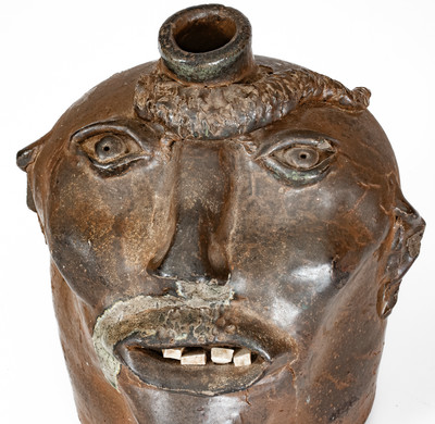 Very Rare Georgia Stoneware Face Jug w/ Applied Lizard, late 19th century