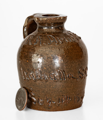 Miniature Albany-Slip-Glazed Stoneware Jug: "R.A. Arnold / Walhalla, S.C. / Sep. 17th 1891"