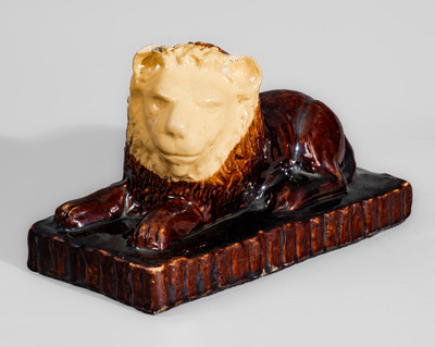 Rockingham-Glazed Ohio Pottery Lion Doorstop, fourth quarter 19th century