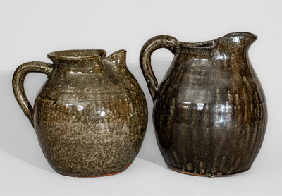 Two Alkaline-Glazed Stoneware Pitchers, Signed 