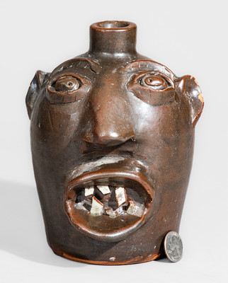 "Brown Pottery / Arden, N.C." Stoneware Face Jug, circa 1940