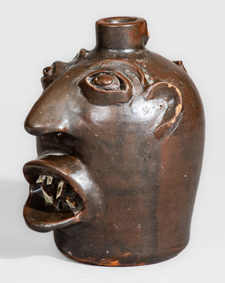 "Brown Pottery / Arden, N.C." Stoneware Face Jug, circa 1940