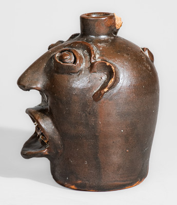 "Brown Pottery / Arden, N.C." Stoneware Face Jug, circa 1940