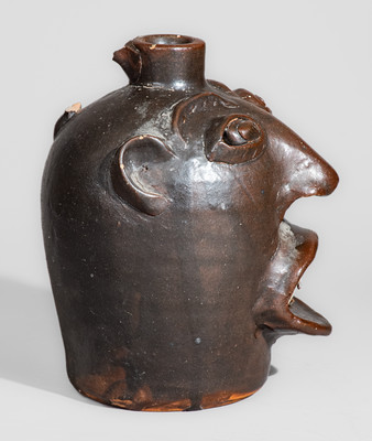 "Brown Pottery / Arden, N.C." Stoneware Face Jug, circa 1940