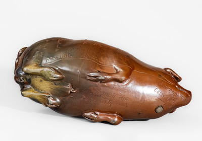 Fine Anna Pottery "Railroad and River Guide" Albany-Slip-Glazed Stoneware Pig Flask, c1875