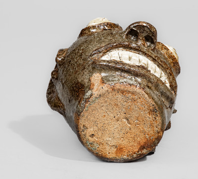 Rare and Fine Small-Sized Edgefield District, South Carolina Stoneware Face Jug w/ Kaolin Eyes and Teeth