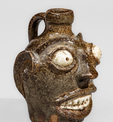 Rare and Fine Small-Sized Edgefield District, South Carolina Stoneware Face Jug w/ Kaolin Eyes and Teeth