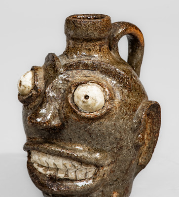 Rare and Fine Small-Sized Edgefield District, South Carolina Stoneware Face Jug w/ Kaolin Eyes and Teeth