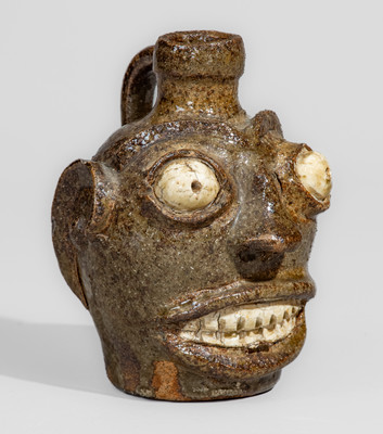 Rare and Fine Small-Sized Edgefield District, South Carolina Stoneware Face Jug w/ Kaolin Eyes and Teeth
