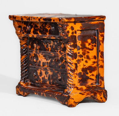 Manganese-Decorated Redware Dresser Bank, probably Pennsylvania