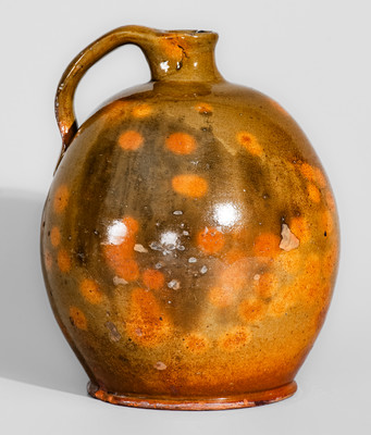 Highly Ovoid New England Redware Jug, early 19th century