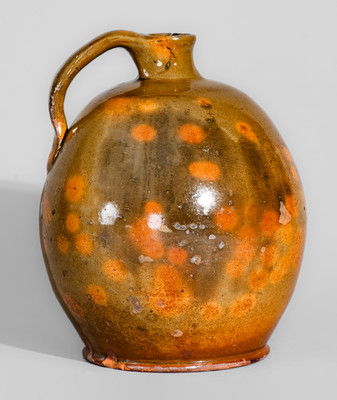 Highly Ovoid New England Redware Jug, early 19th century