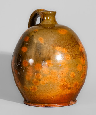 Highly Ovoid New England Redware Jug, early 19th century