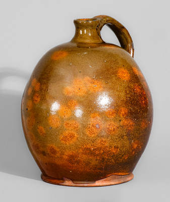 Highly Ovoid New England Redware Jug, early 19th century