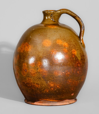 Highly Ovoid New England Redware Jug, early 19th century