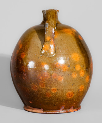 Highly Ovoid New England Redware Jug, early 19th century