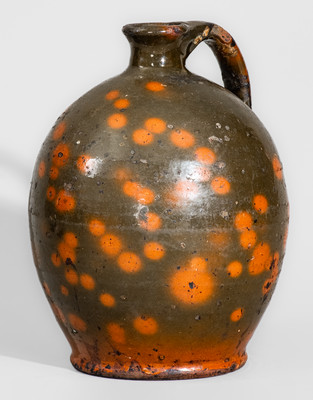 Highly Ovoid New England Redware Jug, first half 19th century