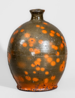 Highly Ovoid New England Redware Jug, first half 19th century