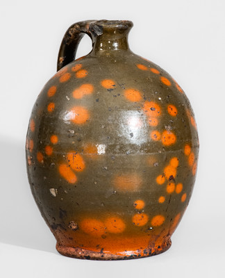 Highly Ovoid New England Redware Jug, first half 19th century