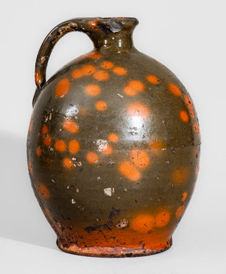 Highly Ovoid New England Redware Jug, first half 19th century