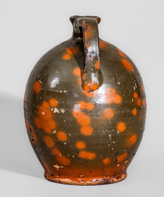 Highly Ovoid New England Redware Jug, first half 19th century