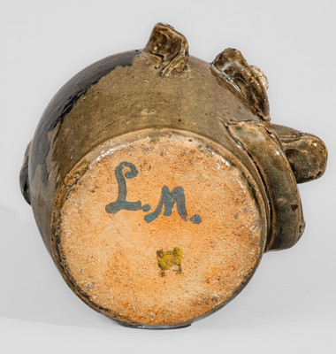 Exceedingly Rare and Important Early-Period Lanier and Arie Meaders Face Jug w/ Rock Eyes and Black Slip