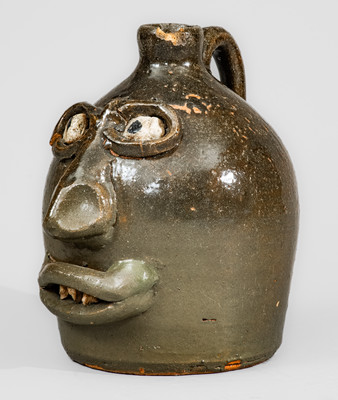 Important and Very Rare Early-Period Lanier Meaders Face Jug w/ Rock Eyes, late 1960's